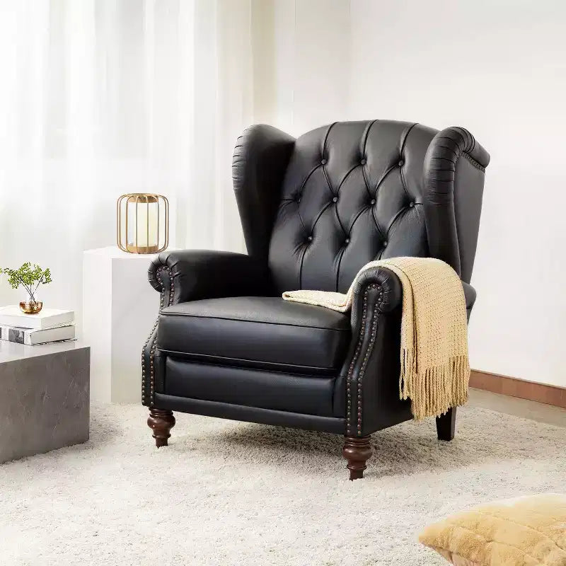 Fauteuil cabriolet en cuir véritable de 84 cm de large avec pieds fuselés en bois et garniture cloutée
