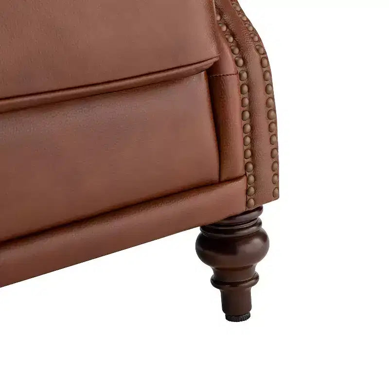 Fauteuil cabriolet en cuir véritable de 84 cm de large avec pieds fuselés en bois et garniture cloutée