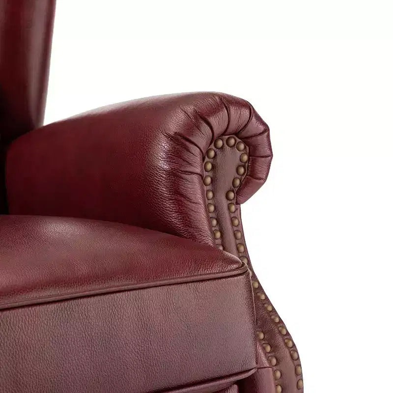 Fauteuil cabriolet en cuir véritable de 84 cm de large avec pieds fuselés en bois et garniture cloutée