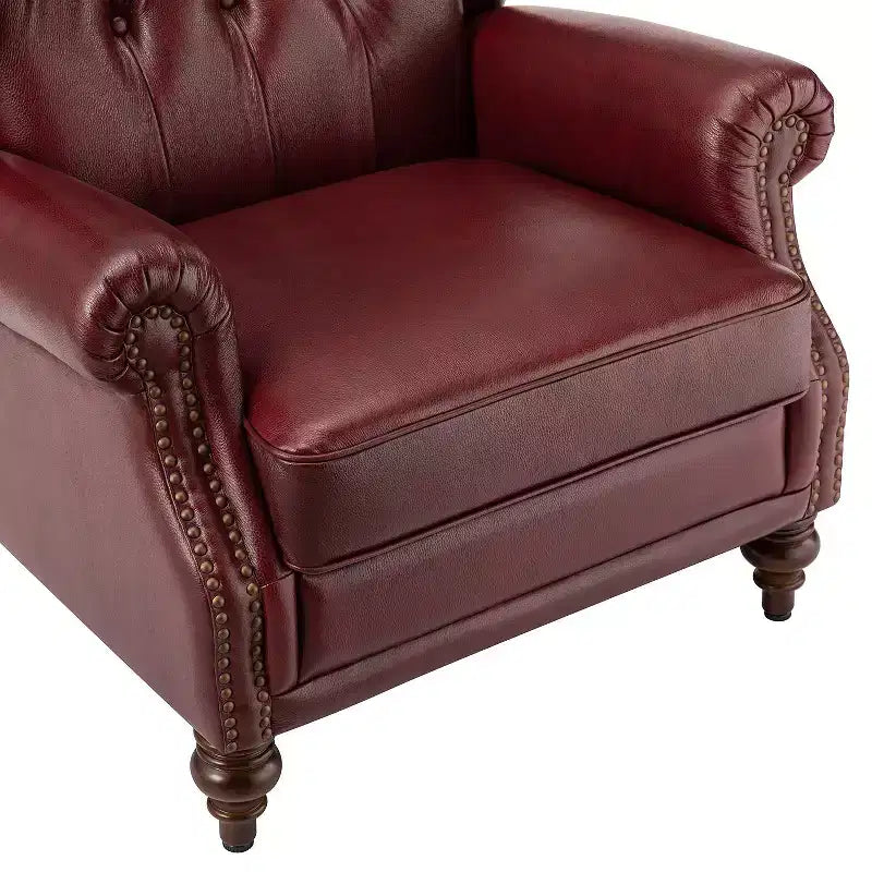 Fauteuil cabriolet en cuir véritable de 84 cm de large avec pieds fuselés en bois et garniture cloutée