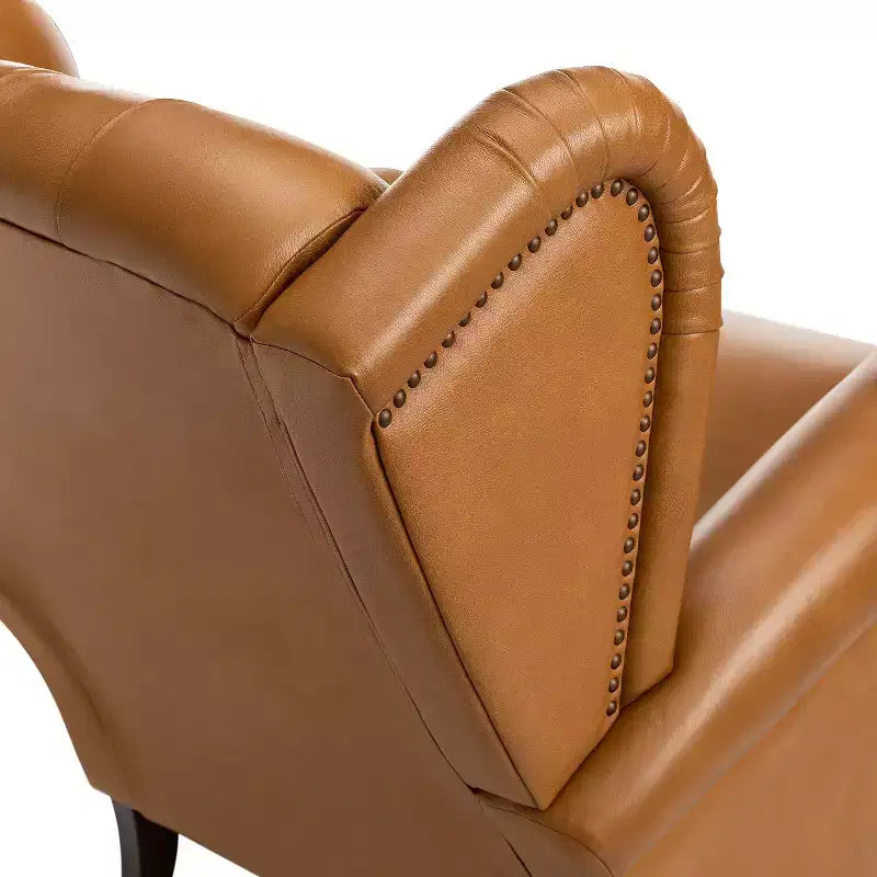 Fauteuil cabriolet en cuir véritable de 84 cm de large avec pieds fuselés en bois et garniture cloutée