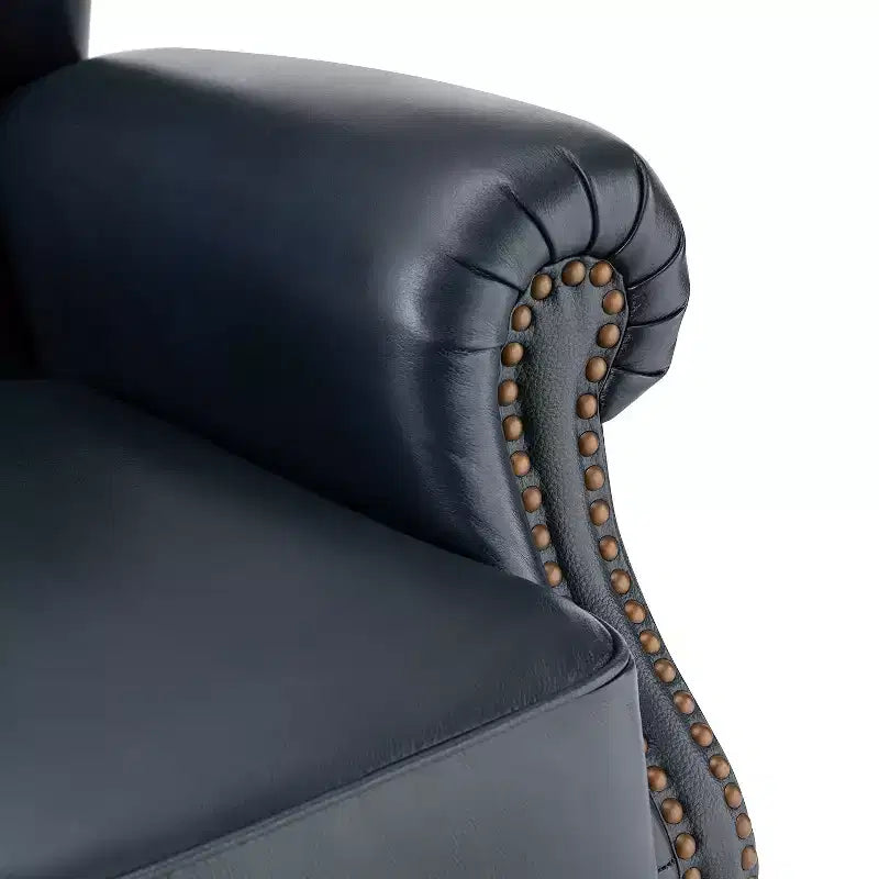 Fauteuil cabriolet en cuir véritable de 84 cm de large avec pieds fuselés en bois et garniture cloutée