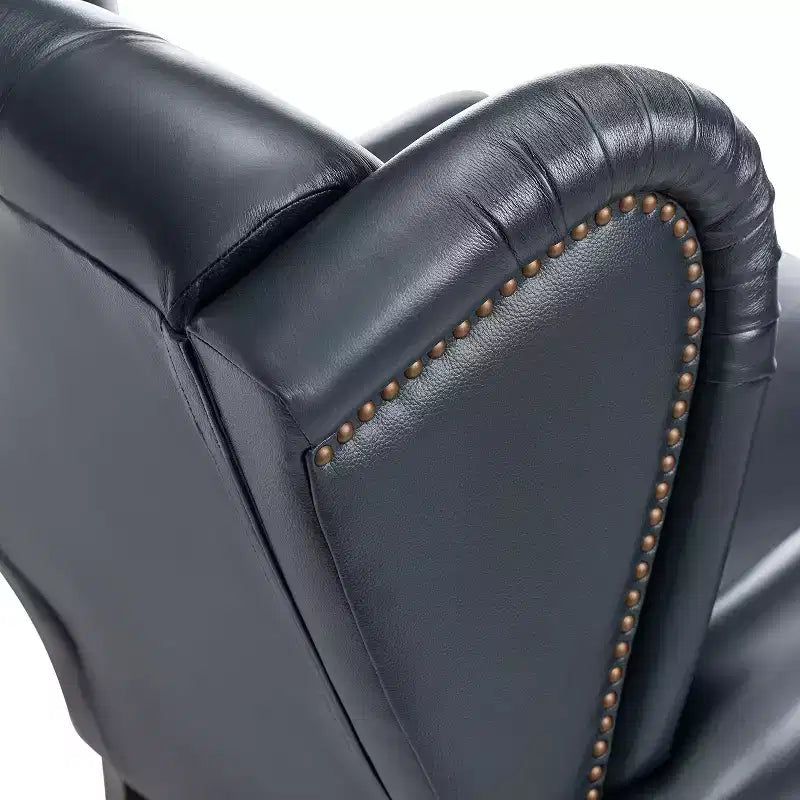 Fauteuil cabriolet en cuir véritable de 84 cm de large avec pieds fuselés en bois et garniture cloutée