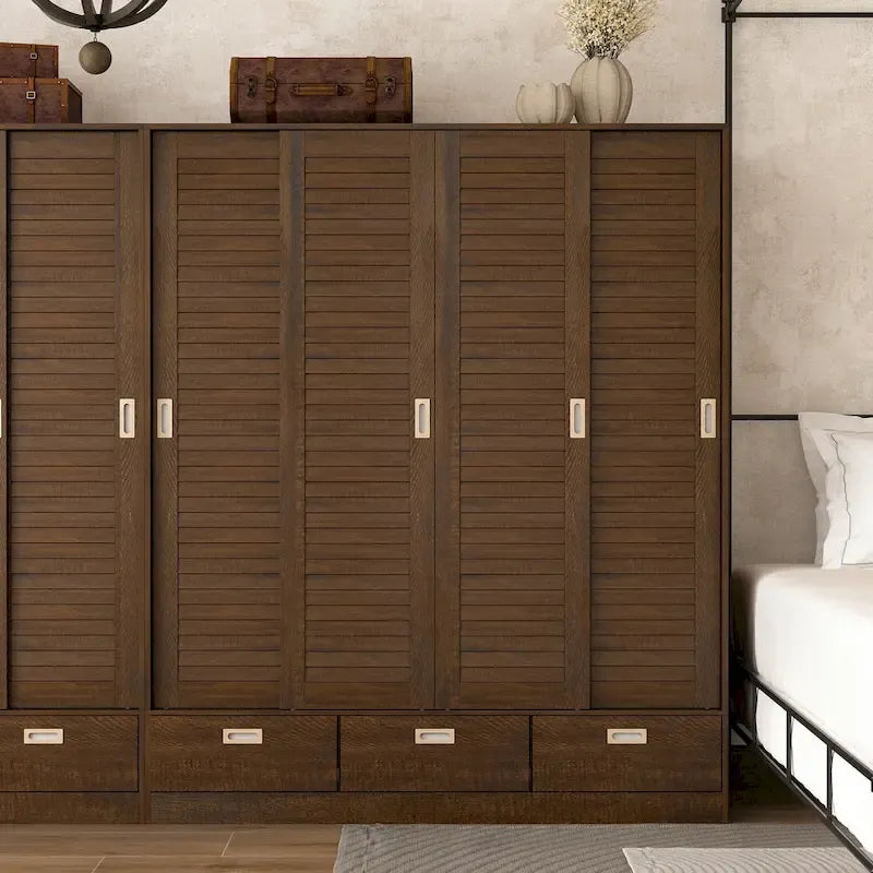 Armoire-penderie marron avec tiroirs, tringle et 4 portes coulissantes